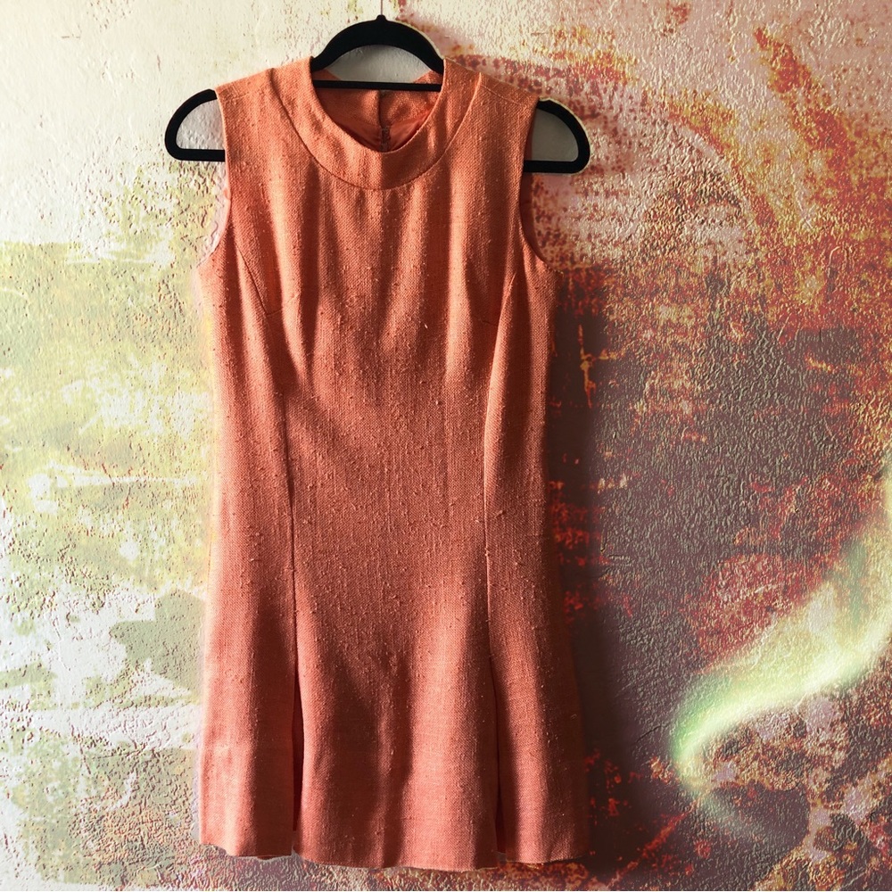 Elegant Sleeveless Kelly Arden Mini Dress in Peach